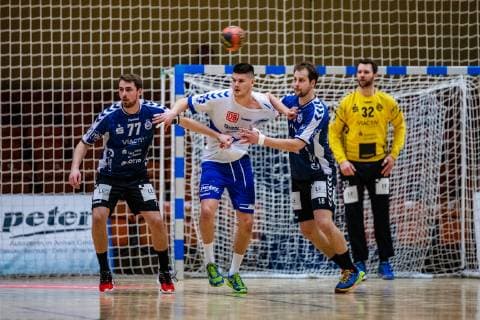 Handball 2 Bundesliga Men Season 2018 2019 Dessau Rosslauer HV 06 VfL Lübeck Schwartau vlr Jasper Bruhn 77 VfL Lübeck Schwartau Philip Jungemann 21 Dessau Rosslauer HV 06 Martin Waschul 18 VfL Lübeck Schwartau Dennis Klockmann 32 VfL Lübeck Schwartau during the season 2018 2019 in the Handball 2 Bundesliga Men between Dessau Rosslauer HV 06 and VfL Lübeck Schwartau in the Anhalt Arena on 17 February 2019 in Bauhausstadt Dessau Sachsen Anhalt Saxony Anhalt Germany Germany
