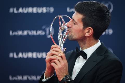 (190219) -- MONACO, Feb. 19, 2019 -- Sportsman of the Year winner Novak Djokovic kisses the trophy after the 2019 Laureus World Sports Awards ceremony in Monaco, Feb. 18, 2019. The 2019 Laureus World Sports Awards were unveiled in Monaco on Monday. ) (SP)MONACO-WORLD SPORTS AWARDS ZhengxHuansong 