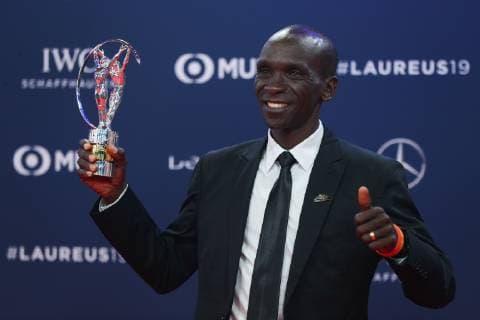 (190219) -- MONACO, Feb. 19, 2019 -- Kenyan athlete Eliud Kipchoge shows the trophy after winning the Academy Exceptional Achievement Award at the 2019 Laureus World Sports Awards ceremony in Monaco, Feb. 18, 2019. The 2019 Laureus World Sports Awards were unveiled in Monaco on Monday. ) (SP)MONACO-WORLD SPORTS AWARDS ZhengxHuansong 
