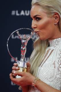 (190219) -- MONACO, Feb. 19, 2019 -- American former World Cup alpine ski racer Lindsey Vonn kisses the trophy after winning the Spirit for Award at the 2019 Laureus World Sports Awards ceremony in Monaco, Feb. 18, 2019. The 2019 Laureus World Sports Awards were unveiled in Monaco on Monday. ) (SP)MONACO-WORLD SPORTS AWARDS ZhengxHuansong 