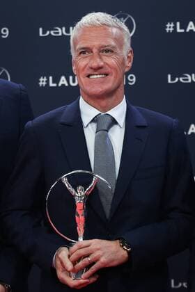 (190219) -- MONACO, Feb. 19, 2019 -- Didier Deschamps, manager of the French men s national football team, shows the trophy after the France World Cup team winning the Team of the Year award at the 2019 Laureus World Sports Awards ceremony in Monaco, Feb. 18, 2019. The 2019 Laureus World Sports Awards were unveiled in Monaco on Monday. ) (SP)MONACO-WORLD SPORTS AWARDS ZhengxHuansong 