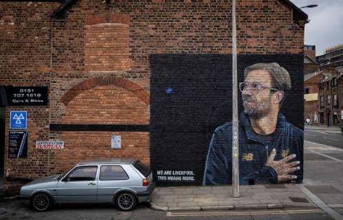 Liverpool 19 02 2019 FC Liverpool street artist immortalizes coach Jürgen Klopp on brick wall FC Liverpool FC Bayern München