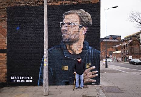 Liverpool 19 02 2019 FC Liverpool street artist immortalizes coach Jürgen Klopp on brick wall FC Liverpool FC Bayern München