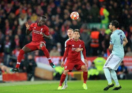19th February 2019, Anfield, Liverpool, England; UEFA Champions League round of 16, Liverpool versus Bayern Munich; Sadio Mane of Liverpool heads the ball forward in midfield  ActionPlus12106780 DavidxBlunsden