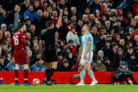 England Liverpool 19 02 2019 UEFA Champions League 2018 19 Season Round of 16 First leg Liverpool FC Bayern Munich Referee Gianluca Rocchi ITA gives Joshua Kimmich FCB yellow card DeFodi048