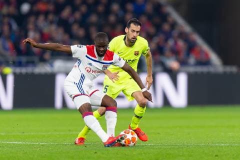 Lyon France 19 02 2019 UEFA Champions League 2018 19 Season quarter-finals Olympique Lyon FC Barcelona Tanguy Ndombele OLY and Sergio Busquets FCB in the duel DeFodi053
