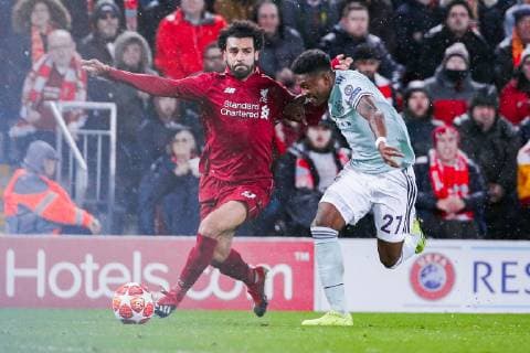 v left in the duel ÊMohamed Salah FC Liverpool and David Alaba FC Bayern Muenchen GER UEFA Champions League Round of 16 FC Liverpool FC Bayern Muenchen 19 02 2019 Liverpool Copyright: xTomxWellerx xEibner-Pressefotox EP_twr