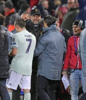19 02 2019 Football UEFA Champions League 2018 2019 Round of 16 FC Liverpool FC Bayern Munich Anfield Stadium in Liverpool England After the final whistle coach Niko Kovac FC Bayern Munich discuss with coach Jürgen Klopp li FC Liverpool DFL and DFB regulations prohibit any use of photographs as image sequences and or quasi video