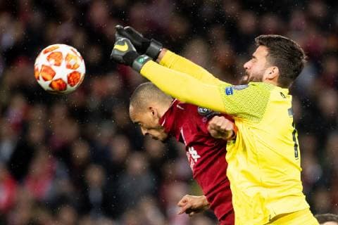 Fabio Henrique Tavares ( Fabinho ) of Liverpool FC, goalkeeper Alisson Becker of Liverpool FC during the UEFA Champions League round of 16 match between Liverpool FC and Bayern Munich at Anfield on February 19, 2019 in Liverpool, United Kingdom UEFA Champions League 2018 2019 xVIxVIxImagesx xTomxBodexMultimediaxIVx 13681247
