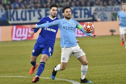 GER CL FC Schalke 04 vs Manchester City 20 02 2019 Veltins Arena Gelsenkirchen GER CL FC Schalke 04 vs Manchester City DFL regulations prohibit any use of photographs as image sequences and or quasi video im Bild v li im Zweikampf Sutat Serdar 8 FC Schalke 04 Jeffrey Bruma 27 Manchester City nph Mauelshagen nph00321