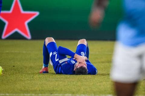 20 02 2019 xkvx Soccer UEFA Champions League FC Schalke 04 Manchester City emspor v l Goal celebration celebrate the goal to 0 1 by Kun Agueero Manchester City Mark Uth S04 Schalke 04 lying on the ground DFL DFB REGULATIONS PROHIBIT ANY USE OF PHOTOGRAPHS as IMAGE SEQUENCES and or QUASI VIDEO Gelsenkirchen
