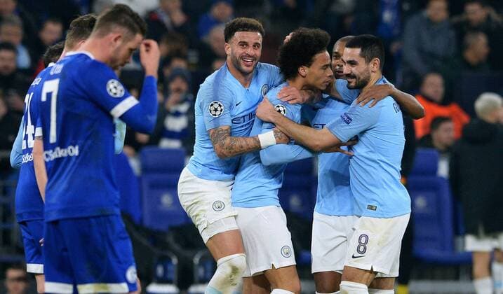 Football UEFA Champions League Men Season 2018 2019 Round of sixteen first leg VELTINS Arena Gelsenkirchen FC Schalke 04 S04 blue Manchester City light blue 2 3 Cheers Leroy Sane MAC after his goal to 2 2 Compensation together with Kyle Walker MAC Ilkay Gündogan MAC next to it Marc Uth S04 disappoints jubilation joy action disappointment frustration UEFA REGULATIONS PROHIBIT ANY USE OF PHOTOGRAPHS AS IMAGE SEQUENCES AND OR QUASI VIDEO disappoints