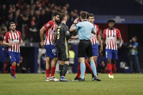 20th February 2019, Wanda Metropolitano, Madrid, Spain; UEFA Champions League football, Atletico Madrid versus Juventus; The referee requests the revision via VAR of the Morata goal that was disallowed for a foul  ActionPlus12107058 LeonardoxPrieto