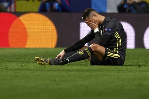 February 20, 2019 - Madrid, Madrid, Spain - Cristiano Ronaldo of Juventus lies injured on the pitch during the UEFA Champions League Round of 16 first leg match between Ateltico Madrid and Juventus at Wanda Metropolitano Stadium on February 20, 2019 in Madrid. Atletico Madrid v Juventus - UEFA Champions League  - ZUMAn230 20190220_zaa_n230_720 Copyright: xJosexBretonx