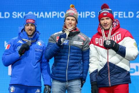 Nordische Ski WM in Seefeld, Langlauf Sprint Herren, Siegerehrung NORDIC SKIING - FIS Nordic World Ski Championships Seefeld 2019 SEEFELD,AUSTRIA,22.FEB.19 - NORDIC SKIING, CROSS COUNTRY SKIING - FIS Nordic World Ski Championships, medal plaza, award ceremony, sprint, men. Image shows Federico Pellegrino (ITA), Johannes Hoesflot Klaebo (NOR) and Gleb Retivykh (RUS). Keywords: medal. GEPAxpictures xCh.xKelemen