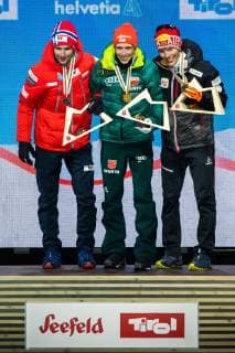 NORDIC SKIING - FIS Nordic World Ski Championships Seefeld 2019 SEEFELD,AUSTRIA,22.FEB.19 - NORDIC SKIING, NORDIC COMBINED - FIS Nordic World Ski Championships, medal plaza, award ceremony, 10km Gundersen, large hill. Image shows Jan Schmid (NOR), Eric Frenzel (GER) and Franz-Josef Rehrl (AUT). GEPAxpictures xPhilippxBrem