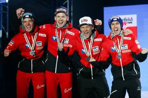 NORDIC SKIING - FIS Nordic World Ski Championships Seefeld 2019 SEEFELD,AUSTRIA,24.FEB.19 - NORDIC SKIING, Ski jumping Skispringen Ski nordisch - FIS Nordic World Ski Championships, team, large hill, award ceremony. Image shows Philipp Aschenwald (AUT), Michael Hayboeck (AUT), Daniel Huber (AUT) and Stefan Kraft (AUT). GEPAxpictures xCh.xKelemen
