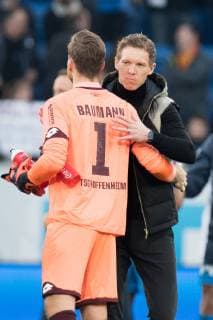 Goalkeeper Oliver BAUMANN li 1899 and coach Julian NAGELSMANN 1899 embrace each other after the end of the game half figure half figure gesture gesture jubilation cheering joy cheers celebrate final cheer portrait format football 1 Bundesliga 22 game day TSG 1899 Hoffenheim 1899 Hanover 96 H 3 0 on 16 02 2019 in Sinsheim Germany Â