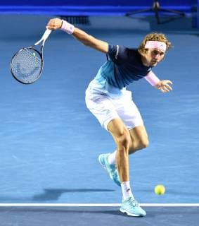 (190301) -- ACAPULCO, March 1, 2019 (Xinhua) -- Alexander Zverev of Germany hits a return during the men s singles quarterfinal match between Alexander Zverev of Germany and Alex De Minaur of Australia at the 2019 ATP Tennis Herren Mexican Open tennis tournament in Acapulco, Mexico, on Feb. 28, 2019. Alexander Zverev won 2-0. (Xinhua Xin Yuewei) (SP)MEXICO-ACAPULCO-TENNIS-ATP-MEXICAN OPEN 