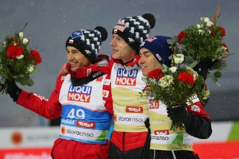 NORDIC SKIING - FIS Nordic World Ski Championships Seefeld 2019 SEEFELD,AUSTRIA,01.MAR.19 - NORDIC SKIING, Ski jumping Skispringen Ski nordisch - FIS Nordic World Ski Championships, normal hill, flower ceremony. Image shows Kamil Stoch (POL), Dawid Kubacki (POL) and Stefan Kraft (AUT). GEPAxpictures xThomasxBachun