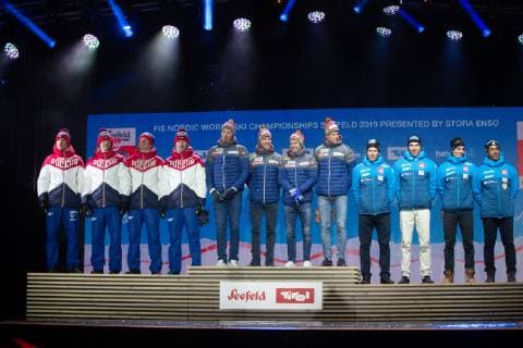 NORDIC SKIING - FIS Nordic World Ski Championships Seefeld 2019 SEEFELD,AUSTRIA,01.MAR.19 - NORDIC SKIING, CROSS COUNTRY SKIING - FIS Nordic World Ski Championships, 4x10km relay, men, medal plaza, award ceremony. Image shows the rejoicing of team RUS, team NOR and team FRA. GEPAxpictures xPhilippxBrem