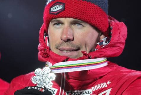 SEEFELD, TIROL, AUSTRIA - MARCH 1, 2019: Silver medalist Sergei Ustyugov of Russia poses with his medal at a medal ceremony after the men s 4x10km cross-country skiing relay race at the 2019 FIS Nordic World Ski Championships. Sergei Bobylev TASS  TS0A2CEF