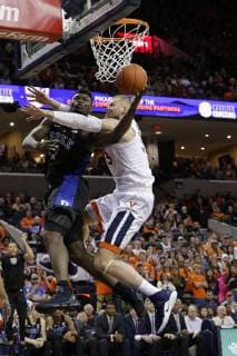 CHARLOTTESVILLE, VA - FEBRUARY 09: Virginia Cavaliers Center (33) Jack Salt fouls Duke Blue Devils Forward (1) Zion Williamson as he goes to the basket during a game between the Duke Blue Devils and the University of Virginia Cavaliers at the John Paul Jones Arena in Charlottesville, Virginia on February 9, 2019. (Photo by Justin Cooper Icon Sportswire) COLLEGE BASKETBALL: FEB 09 Duke at Virginia Icon19020949
