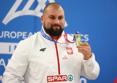 2nd March 2019, Emirates Arena, Glasgow, Scotland; European Athletics Indoor Championships, day 2; Michal Haratyk (POL) holds up his goal medal for the mens Shot Put event  ActionPlus12109866 VagelisxGeorgariou