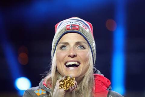 SEEFELD, TIROL, AUSTRIA â€“ MARCH 2, 2019: Cross-country skier Therese Johaug (gold) of Norway poses at a medal ceremony for the ladies 30km mass start race at the 2019 FIS Nordic World Ski Championships. Sergei Bobylev TASS  TS0A2FC9