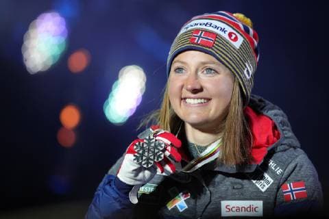 SEEFELD, TIROL, AUSTRIA â€“ MARCH 2, 2019: Cross-country skier Ingvild Flugstad Ostberg (silver) of Norway poses at a medal ceremony for the ladies 30km mass start race at the 2019 FIS Nordic World Ski Championships. Sergei Bobylev TASS  TS0A2FCB