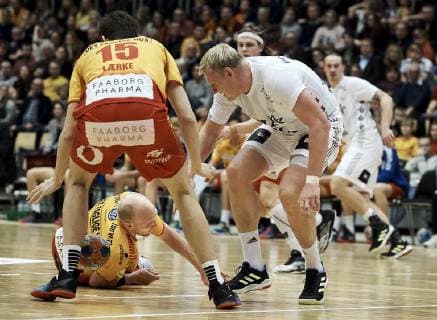 Odense EHF Cup mens handball GOG THW Kiel Arena Funen in Odense on March 3, 2019 fight ends 22 26 GOGs Lars Hald 18 after meeting with Patrick Wiencek 17 Photo Robert Wengler Odense Denmark,  Copyright: ©RobertxWengler RobertxWenglerx COP107 spdk20190303-173017-L