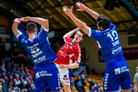 Handball 2 Bundesliga Men Season 2018 2019 Dessau Rosslauer HV 06 Handball Hamburg Dominik Axmann 15 Hamburg Handball Philip Jungemann 21 Dessau Rosslauer HV 06 Daniel Schmidt 19 Dessau Rosslauer HV 06 during Season 2018 2019 Handball 2 Bundesliga Men between Dessau Rosslauer HV 06 and Handball Hamburg in the Anhalt Arena on 3 March 2019 in Bauhausstadt Dessau Sachsen Anhalt Saxony Anhalt Germany