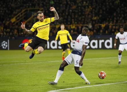 Paco Alcacer of Borussia Dortmund attempts to get past Davinson Sanchez of Tottenham during the UEFA Champions League Round of Sixteen match at the Signal Iduna Park Stadium, Dortmund. Picture date: 5th March 2019. Picture credit should read: David Klein Sportimage EDITORIAL USE ONLY. No use with unauthorised audio, video, data, fixture lists, club league logos or live services. Online in-match use limited to 120 images, no video emulation. No use in betting, games or single club league player publications. _1DK3636.JPG