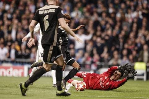 5th March 2019, Santiago Bernabeu, Madrid, Spain; UEFA Champions League football, round of 16, second leg, Real Madrid versus Ajax; David Neres (Ajax) shoots and scores past keeper Courtois to make it 0-2 in the 18th minute  ActionPlus12111153 LeonardoxPrieto