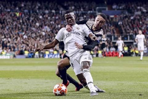 MADRID, 05-03-2019, Stadium Bernabeu, season 2018 2019 , Champions League 1 8th round second leg. Real Madrid player Vinicius Junior (L) and Ajax player Noussair Mazraoui (R) during the game Real Madrid - Ajax . Real Madrid - Ajax  x2901429x
