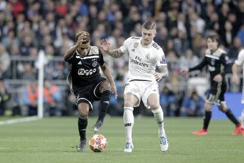 Real Madrid s Toni Kroos and AFC Ajax s David Neres during a UEFA Champions League match. Round of 16. Second leg. March, 5,2019.  (2019030507)
