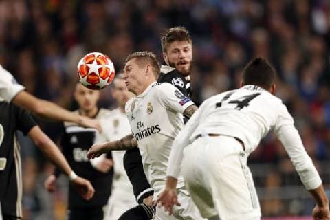 (l-r) Toni Kroos of Real Madrid, Lasse Schone of Ajax during the UEFA Champions League round of 16 match between Real Madrid and Ajax Amsterdam at the Santiago Bernabeu stadium on March 05, 2019 in Madrid, Spain UEFA Champions League 2018 2019 xVIxVIxImagesx xMauricexvanxSteenxIVx 13823429