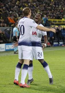 Scorer Harry Kane of Tottenham celebrates with Serge Aurier of Tottenham during the UEFA Champions League Round of Sixteen match at the Signal Iduna Park Stadium, Dortmund. Picture date: 5th March 2019. Picture credit should read: David Klein Sportimage EDITORIAL USE ONLY. No use with unauthorised audio, video, data, fixture lists, club league logos or live services. Online in-match use limited to 120 images, no video emulation. No use in betting, games or single club league player publications. _1DK4091.JPG