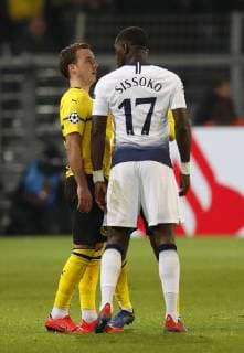 Mario Gotze of Borussia Dortmund and Moussa Sissoko of Tottenham exchange words during the UEFA Champions League Round of Sixteen match at the Signal Iduna Park Stadium, Dortmund. Picture date: 5th March 2019. Picture credit should read: David Klein Sportimage EDITORIAL USE ONLY. No use with unauthorised audio, video, data, fixture lists, club league logos or live services. Online in-match use limited to 120 images, no video emulation. No use in betting, games or single club league player publications. SPI_066_DK_Dortmund_Spurs.jpg