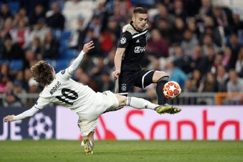 (L-R) Luka Modric of Real Madrid, Dusan Tadic of Ajax during the UEFA Champions League round of 16 match between Real Madrid and Ajax Amsterdam at the Santiago Bernabeu stadium on March 05, 2019 in Madrid, Spain UEFA Champions League 2018 2019 xVIxVIxImagesx xMauricexvanxSteenxIVx 13824518