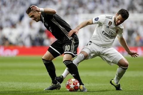 Real Madrid x Ajax MADRID, MA - 05.03.2019: REAL MADRID X AJAX - Tadic and Nacho during a match between Real Madrid and Ajax, valid for the Champions League, held at the Santiago Bernabéu Stadium in Madrid, Ma. The game is valid for the Eighth Finals. (Photo: Marco Galvão Fotoarena) x1693296x  MarcoxGalvão