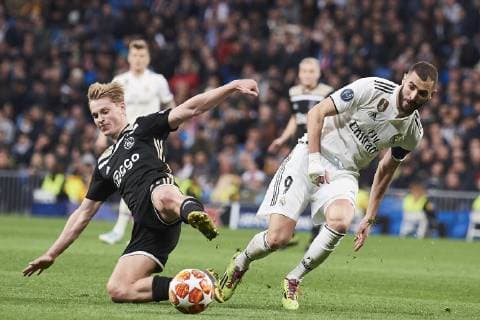 March 5, 2019 - Madrid, Spain - Frenkie de Jong (midfielder; AFC Ajax), Karim Benzema (forward; Real Madrid) in action during the UEFA Champions League Round of 16 Second Leg match between Real Madrid and AFC Ajax at Santiago Bernabeu on March 5, 2019 in Madrid, Spain Real Madrid v Ajax - UEFA Champions League Round of 16: Second Leg  - ZUMAg15_ 20190305_zaf_g15_175 Copyright: xJackxAbuinx