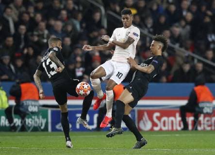 Marcus Rashford of Manchester United ManU tackled by Dani Alves of PSG during the UEFA Champions League Round of Sixteen match at the Parc des Princes Stadium, Paris. Picture date: 6th March 2019. Picture credit should read: David Klein Sportimage EDITORIAL USE ONLY. No use with unauthorised audio, video, data, fixture lists, club league logos or live services. Online in-match use limited to 120 images, no video emulation. No use in betting, games or single club league player publications. _K2I5777.JPG