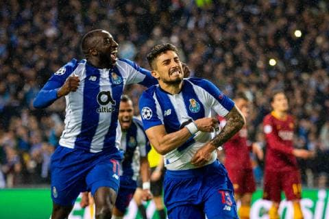 March 6, 2019 - Porto, Portugal - FC Porto s players Alex Telles (R) and Moussa Marega (L) celebrates the third goal during the match against AS Roma for the UEFA Champions League round 16th 2nd leg at Dragon Stadium in Porto..Final Score: FC Porto 3-1 AS Roma UEFA Champions League: FC Porto vs AS Roma in Portugal - 06 Mar 2019 - ZUMAs197 20190306_zaa_s197_169 Copyright: xDiogoxBaptistax
