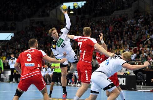 Handball international in Düsseldorf Germany Switzerland 09 03 2019 Franz Semper Deut throws in front of Lucas Meister li and Samuel Röthlisberger both Switzerland Patrick Wiencek Deut ducks away on the far right HM