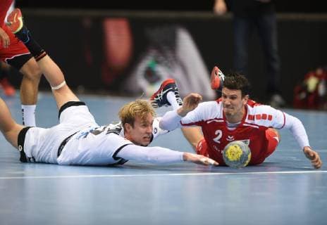 Handball international match in Düsseldorf Germany Switzerland 09 03 2019 Marian Michalczik Deut li and Andy Schmid Switzerland try to get the ball HM