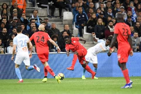 27 JEAN VICTOR MAKENGO (NICE) - 17 BOUNA SARR (OM) FOOTBALL : Marseille vs Nice - Ligue 1 Conforama - 10 03 2019 AnthonyBIBARD FEP Panoramic 