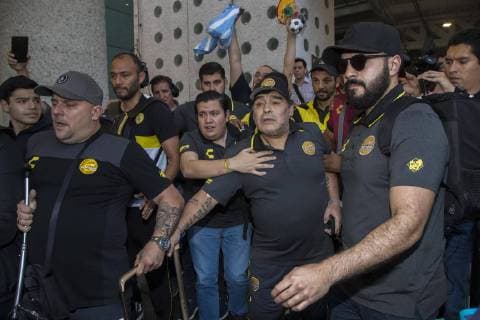 March 11 2019 EUM20190311DEP15 JPG MEXICO CITY Soccer Soccer Diego Maradona March 11, 2019 Diego Armando Maradona technical director of the Dorados de Sinaloa team accompanied by their players on their arrival at the Airport in the City of Sinaloa. Mexico facing the meeting that will be held this Wednesday with the Pumas of the UNAM at the University Olympic Stadium corresponding to quarterfinals of the MX Cup Photo Agency THE UNIVERSAL Yadin Xolalpa RCC Latin News March 11 2019  - ZUMAu78_ 20190311_zaf_u78_090 Copyright: xYadinxXolalpax
