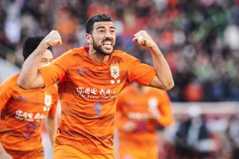 Italian football player Graziano Pelle of China s Shandong Luneng Taishan F.C. celebrates after scoring against Japan s Kashima Antlers F.C. in their group E match during the 2019 AFC Champions League in Ji nan city, east China s Shandong province, 12 March 2019. Kashima Antlers competes against Shandong Luneng Taishan at 2019 Champions League  20190312_605440
