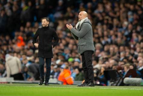 Manchester City v FC Schalke 04 UEFA Champions League Manchester City manager Pep Guardiola (right) encourages his players during the UEFA Champions League match at the Etihad Stadium, Manchester Content Not Available For UK Newspapers Copyright: xRussellxHartx FIL-12984-0010